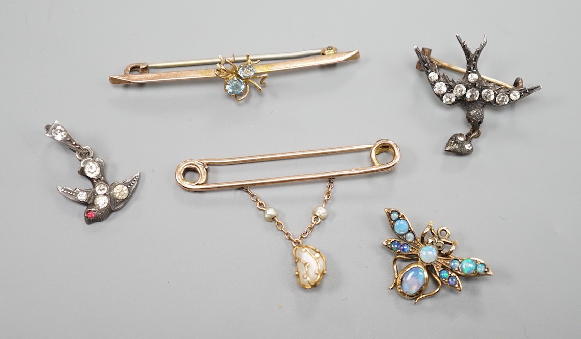 A modern 9ct gold and opal set bug brooch, 24mm, a paste set white metal swallow pendant and similar brooch and two yellow metal bar brooches, one with gem set spider, the other with baroque pearl drop.